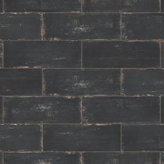 a black brick wall that is very dark