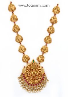 22 Karat Gold 'Lakshmi' Necklace with Beads & Pearls (Temple Jewellery)
  Necklace Length with Pendant : 14.00 inches - 235-GN4217 - in 34.050 Grams for USD $2454.79. 
Made in India by Totaram Jewelers Online this product is in Gold - 22 Karat BIS Hallmark 916 KDM Gold  & is an excellent gift for Adult - Women. Ships fully insured with secured guaranteed delivery for free with your order over $250 from New Jersey USA & comes with 30 days exchange policy. Totaram Jewellery Necklaces, Lakshmi Pendant Gold, Temple Jewellery Necklace, Haram Designs, 22k Gold Necklace, Necklace With Beads, Temple Jewelry Necklace, Gold Temple Jewellery, Gold Jewels Design