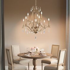 Bring elegance and sophistication to your home with the Minka Lavery Vogan 9-Light Chandelier. This traditional style chandelier features a stunning brio gold finish and is made of high-quality steel, glass, and crystal materials. The chandelier is 31.5 inches wide and deep, 37.5 inches high, and can be adjusted to a maximum of 113 inches. Its 9 candelabra bulbs with a maximum wattage of 60 each (bulbs not included) provide ample light for any room. The Vogan Chandelier's design is inspired by classic European elegance. The brio gold finish adds a touch of luxury to any space, while the crystal accents on the chandelier's arms and center column create a dazzling effect. The clear glass shades allow for maximum light distribution, making it a perfect fit for your foyer, dining room, or kitc Tiered Chandelier, European Elegance, Minka Lavery, Chandelier Design, Candle Styling, Candelabra Bulbs, Light Candle, Curtain Accessories, Light Chandelier