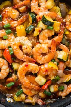 shrimp and vegetable stir fry in a skillet