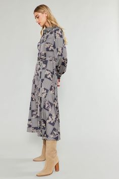 A floral-infused checker motif adds to the charm of this shirt dress. Wear it buttoned all the way up for a polished look, or leave it undone to convey a casual vibe. The tie belt is optional, so you can draw in the waist or let it flow. Finally, the ultra-plush and silky feel of the fabric provides true comfort and everyday luxury. •Ultra soft •Pointed collar •Slim fit •Button placket •Three quarter sleeves •Button cuffs •Optional tie belt •Mid-length hem Item number 2390125-1 Gentle cycle cold Chic Plaid Midi Dress For Work, Chic Patterned Midi Dress For Fall, Fall Floral Print Button-up Shirt Dress, Floral Print Shirt Dress For Workwear In Fall, Floral Print Shirt Dress For Fall Workwear, Fall Floral Print Shirt Dress For Workwear, Fall Floral Print Midi Shirt Dress, Chic Plaid Midi Dress For Daywear, Chic Plaid Shirt Dress For Spring