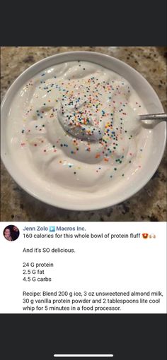 a white plate topped with whipped cream and sprinkles on top of it