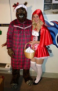 a man and woman dressed up in costumes