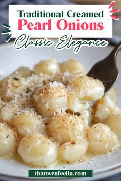 a white plate topped with pasta covered in parmesan cheese