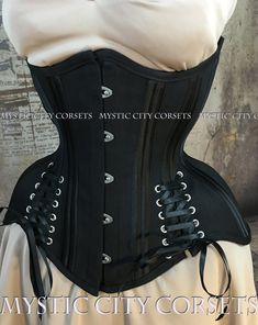 "New LONG LINE UNDERBUST from \"MystiC City Corsets\" design: MCC-61 \"ANTI-MUFFIN\" BLACK COTTON/black satin ORIGINAL design/photo: \"MystiC City Corsets\" front length: 12\" side length: 10-14\" back length: 13.5\" - fashion layer: black 100% cotton twill  - lining: 100% cotton twill steel boning  - 4 x 12mm wide \"white\" flat steel flexible bones  - 20 x 6mm wide spiral steel bones - steel busk (STIFF) - boned underbusk for extra stiff front support ( 1\" wide flat bone can be easy removed- Corset Shop, Cotton Corset, Corset Training, Steel Boned Corsets, Boned Corsets, Beautiful Wedding Gowns, Lace Tights, Waist Training Corset, Layered Fashion