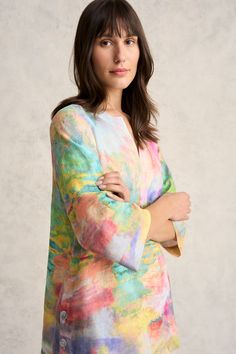 Inject a little joie de vivre into your wardrobe with our Printed Linen Tunic. Featuring pastel tones that come together to create a stunning Abstract Landscape print, this tunic features top stitch detailing along the notched neckline and chic side button detailing. Wear it with our Full Length Waist Tab Linen Pant in Natural Cross Dye for a complete spring-inspired look.