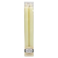 two white candles in a package on a white background