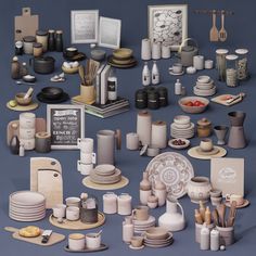 an assortment of pottery is displayed on a table