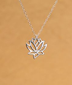 Silver lotus necklace - gold lotus flower - yoga necklace - blooming flower - a little lotus flower on a sterling silver chain This simple and classy, solid sterling silver lotus hangs from an 16 inch sterling silver chain. Please feel free to select a different length chain if you prefer! These beauties are also available in matte and shiny gold vermeil. Here is a link to the larger version :) https://www.etsy.com/listing/154068753/lotus-necklace-gold-lotus-flower?ref=shop_home_listings Need a Lotus Necklace Gold, Gold Lotus Flower, Yoga Necklace, Lotus Necklace, Gold Lotus, Blooming Flowers, Sterling Silver Chain, Lotus Flower, Necklace Gold