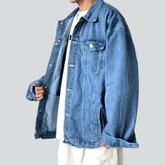 Step out in vibe with our 2023 Spring-Summer Collection street men's jean jacket. With its oversized, buttoned closure design, it offers the perfect blend of vintage allure and modern street trend. Show off your bold fashion sense with the audacious natural hem and luxe denim fabric, while the exquisite zipper closure ensures you look impeccable and feel it, too.Discover These Street Style Features: Retro Meets Modern: Revel in a creation that effortlessly infuses bygone elegance into modern-day Jean Jacket Men, Closure Design, Street Trends, Oversized Denim Jacket, Vintage Denim Jacket, Feel It, Street Chic, Jackets Online, Bold Fashion