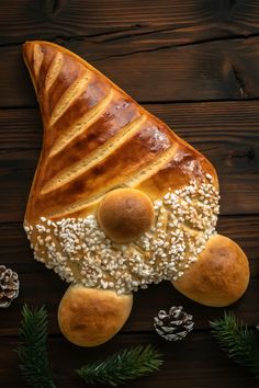 bread with white sesame seeds and sprinkles in the shape of a gnome's hat