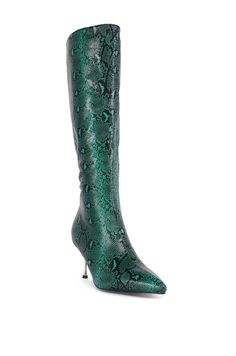 The AZALEA WANG Jacaranda Green Snake Embossed Embellished Heel Boot is a mid-calf boot featuring a textured faux leather upper with a beautifully embossed snake print, a pointed toe silhouette, a textured outsole, and a reflective metallic slim stiletto heel, detailed with opulent rhinestone embellishments. Complete with a padded fabric interior, a pull-on fit, and a tonal inner ankle zipper closure.   (all measurements are approximate from size 7.5) - Faux Leather Upper - Pointed Toe - Slim Stiletto Heel - Mid-Calf Shaft - 3.25” Heel Height  - 15.5” Shaft Height - 16.5” Top Shaft Circumference - Imported  Product ID: 427990 Green Snake, Azalea Wang, Embellished Heels, Heel Boot, Rhinestone Embellishments, Mid Calf Boots, Snake Print, Stiletto Heel, Mid Calf