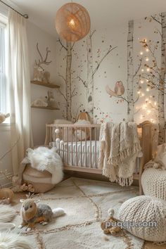 a baby's room decorated in white and gold with lots of lights on the ceiling