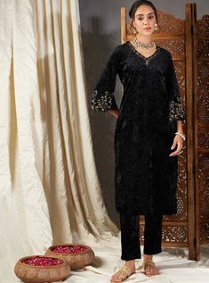 * Ethnic Motifs Embroidered Grandeur & Majestic Artwork Velvet Kurta * Velvet Kurta / Pure Cotton Kurta Set / Sleeveless Kurta Set / Indian Wedding Wear Salwar Kameez / Silk Kurta Sets / Indian Ethnic Dress / Plus Size Silk Kurta Dress * Colour: black * Ethnic motifs embroidered * V-neck * Three quarter, regular sleeves * Straight shape with regular style * Thread work detail * Ankle length with straight hem * Velvet * Fabric:-  Velvet *Wash Care:-  Dry clean *Package Contains:-  Only One Kurta AVAILABLE IN 7 SIZES THEY ARE IN FOLLOWING MEASUREMENTS IN INCHES:- XXS:- Bust-32/To Fit Waist-26/Length-45/Hip-34 XS:- Bust-34/To Fit Waist-28/Length-45/Hip-36 S:- Bust-36/To Fit Waist-30/Length-45/Hip-38 M:- Bust-38/To Fit Waist-32/Length-45/Hip-40 L:- Bust-40/To Fit Waist-34/Length-45/Hip-42 XL:- Black Long Sleeve Dress For Navratri, Elegant Embroidered Fitted Dress For Navratri, Elegant Embroidered Dress For Navratri, Elegant Fitted Embroidered Dress For Navratri, Elegant Embroidered Dress With Zari Work For Navratri, Traditional Embroidered Straight Kurta Dress With Dupatta, Black Straight Kurta For Party, Elegant Straight Kurta Embroidered Dress For Diwali, Elegant Embroidered Straight Kurta Dress For Diwali