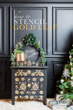 a black and gold christmas chest with the words how to stencil gold leaf on it