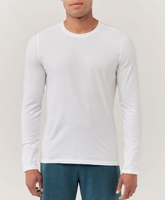 Men's White Softspun Long Sleeve Tee L. Super soft organic men's Softspun Long Sleeve Tee from Wear PACT. Fair Trade Factory. GOTS Certified Organic Cotton Sporty Cotton Tops For Loungewear, Pima Cotton Crew Neck Tops For Everyday, Casual Crew Neck Pima Cotton Top, Casual Pima Cotton Crew Neck Top, Casual Crew Neck Top In Pima Cotton, Sporty Cotton Top For Layering, Fitted Cotton Shirt For Loungewear, Casual Everyday Tops In Pima Cotton, Stretch Cotton T-shirt For Layering