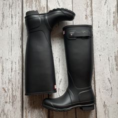 New In Box! Hunter Women’s Original Tall Rain Boots Features: Waterproof, Handcrafted From 28 Parts, Polyester Lining, Rubber Outsole With Hunter Original Tread Pattern, Crafted From Natural Vulcanised Rubber With Matte Finish Size: 9 Color: Black (Matte Finish) Please Note, Box May Have Some Damage. This Does Not Affect The Wear Of The Boots. Also, These Cannot Be Bundled With Other Items Due To The Weight. Thank You For Your Understanding. Last Two Pictures Are Stock Photos To Show Look. Slip-resistant Black Boots For Rainy Weather, Classic Black Waterproof Slip-resistant Boots, Black Slip-resistant Round Toe Rain Boots, Black Boots With Rubber Sole For Rainy Weather, Slip-resistant Black Rain Boots For Outdoor Activities, Black Slip-resistant Rain Boots For Outdoor Activities, Black Slip-resistant Boots For Rainy Weather, Black Slip-resistant Waterproof Boots For Rainy Weather, Black Round Toe Rain Boots For Outdoor Activities