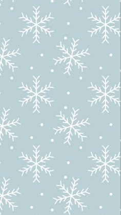 snowflakes on a blue background with white dots