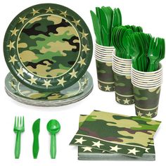 a table set with plates, napkins and green forks