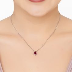 Step into a realm of passion and elegance with our Harriett Mini Teardrop Pendant Necklace. This exquisite piece features a teardrop-shaped pendant embracing a lab-created Ruby gemstone renowned for its deep, rich red tones. Ruby, symbolizing love and vitality, elevates this necklace from a mere accessory to a beacon of strength and passion, making it a perfect choice for July birthdays or to celebrate a 40th wedding anniversary.  For a unified look, pair it with our matching bracelet. Handcrafted in 925 Sterling Silver dipped in Rhodium. Lab grown Ruby Gemstone.   Packaging:  This item is presented in Latelita London signature packaging.  Care Instructions:  To maintain your jewellery, wipe gently with a damp cloth that is soft and clean. Do not soak in water. Avoid contact with soaps, de Gemstone Teardrop Pendant Drop Necklace, Elegant Ruby Teardrop Pendant Necklace, Ruby Teardrop Pendant Necklace, Elegant Red Teardrop Pendant Drop Necklace, Red Teardrop Gemstone Drop Necklace, Solitaire Teardrop Pendant Necklace, Elegant Red Drop Necklace, Red Teardrop Necklace For Formal Occasions, Elegant Red Gemstone Drop Necklace