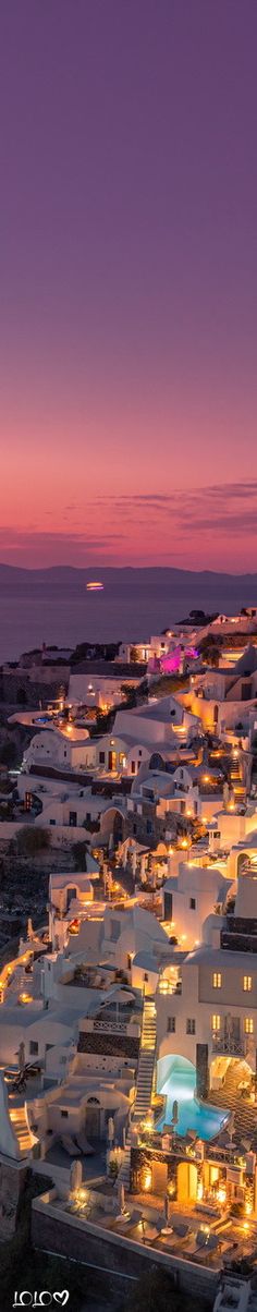 an aerial view of a city at night