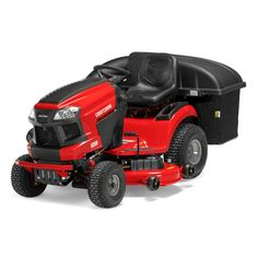 a red riding lawn mower on a white background