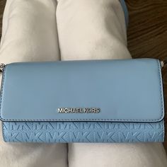 Wallet On Chain Michael Kors Bag. Brand New, Never Used. Baby Blue Color Blue Crossbody Travel Wallets, Blue Wallet With Mobile Phone Bag For Everyday Use, Blue Crossbody Wallet With Mobile Phone Bag, Blue Wallets With Mobile Phone Bag For Everyday Use, Blue Clutch Wallet With Mobile Phone Bag, Everyday Blue Clutch With Mobile Phone Bag, Blue Wallet, Baby Blue Colour, Michael Kors Bag