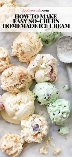 homemade ice cream cookies on a marble surface with spoons and cookie crumbs