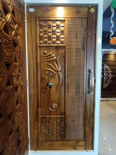 a wooden door with carvings on it