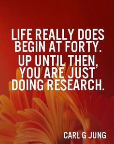 an orange flower with the words life really does begin at forty up until you are just doing research