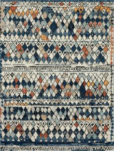 an old rug with many different colors and patterns on it, including blue, red, orange