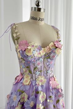 Embroidery Floral Illusion Corset Top? Bust and Skirt with full lining. 100% Polyester 100% Recycled polyester lining Concealed zip at center back Imported Dress With 3d Flowers, Midi Prom Dress, Corset Midi Dress, Floral Corset, Lavender Dresses, Lavender Floral, Lace Prom Dress, Embroidery Floral, Tea Length