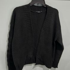 Black Size Medium Sweater Like Brand New Worn Once Black Cardigan For Spring And Cold Weather, Black Cardigan For Spring, Black Cardigan For Spring Cold Weather, Casual Black Cardigan For Cold Weather, Black Cardigan For Cold Weather In Spring, Casual Black Cardigan For Layering, Colorful Sweaters, Sweaters & Cardigans, Cardigans