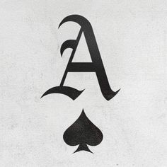 the letter a is made up of playing cards and spades on a white background