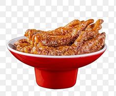 a red bowl filled with fried food on top of a white tablecloth png