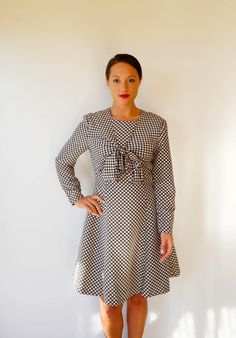 "💌 FREE SHIPPING in the US!! 💌 DESCRIPTION * vintage dress from 1980s, made in Japan * beige polka dot on grey background * with extra fabric wrap to tie in the front * long sleeves * back zipper closure * A line skirt * tag reads \"Fabb Dabb\" CONDITION * the dress is in good condition. Sold as is. * All pre-loved clothing might have small stains, discoloration or minor wears. I try my best to describe any imperfection as I can. Please ask any question you might have before making a purchase. Retro Polka Dot Dress For Work, Retro Polka Dot Workwear Dresses, Vintage Polka Dot Long Sleeve Dresses, Vintage Long Sleeve Polka Dot Dress, Vintage Polka Dot Dress, Vintage Dress 80s, Japanese Dress, Cocktail Hat, 1980s Dresses