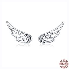 Lovely and so tiny - these minimalist angel wing earrings feature two bright CZ Rhinestones in the center to shine! Earrings are 925 Sterling Silver and contain round stud backs. 1 pair per order.Please note: This is a final sale product, and no returns or exchanges are accepted.Product requires extended processing and shipping time. Packages may arrive separately if ordered with other items. Stud Earrings Silver, Angel Wing Earrings, Silver Feather, Fairy Wings, Wing Earrings, Sterling Silver Flowers, Sterling Silver Studs, Sterling Silver Earrings Studs, 925 Sterling Silver Earrings