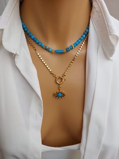 The gold-plated Turquoise stone motif necklace and gold-plated turquoise eye detail pendant with chain in our set emphasize the originality and aesthetics of each piece. It is a modern precious semi-natural stone necklace for women, handmade in turquoise color with a stylish and elegant look. Our gold-plated chains are durable and rustproof, always keeping their shine. Sizes from small to large: Turquoise semi-natural stone bead size: 42 cm (16.53 inches) Turquoise eye-tipped chain size: 53 cm ( Bead Necklace With Pendant, Gold Turquoise Necklace With Beaded Chain As Gift, Gold Beaded Turquoise Pendant Necklace, Eye Detail, Turquoise Eyes, Eye Pendant Necklace, Eye Details, Natural Stones Necklace, Eye Pendant