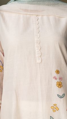 Editor's Note A Beautiful Combination Of Porcelain And Sage, This Kurta Set Features Applique Work, A Front Plaquet And Scalloped Bottoms With A Sheer Panel. The Minimal Porcelain Kurta Is Paired With Faded Tones Of A Sage Dupatta To Complete The Look. Color: White Fabric: Cotton Muslin Care: Dry Clean Only About the Designer Vaayu stems from the new ethos of thoughtful and personal design which connects the wearer to the maker. We work closely with craftsmen and weavers across the country to cr Elegant White Kurta With Floral Embroidery, Spring Cotton Kurta With Tonal Embroidery, Cotton Kurta With Tonal Embroidery, Off White Mulmul Kurta With Floral Embroidery, White Kurta With Floral Embroidery, Applique Kurta, Kurta Ideas, Salwar Pattern, Exhibition Ideas