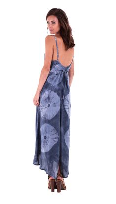 Sexy and elegant. This flowy asymmetrical maxi dress with spaghetti straps is loose and comfortable. Perfect to wear on a date, a stroll on the beach, or on a tropical vacation. Love your style with this beautiful print dress. Deep V neck Lightweight and flowy 100% soft rayon Spaghetti straps Summer V-neck Maxi Dress With Adjustable Straps, Casual Flowy Dress For Beach Wedding, Casual Summer Beach Wedding Dress, Casual Summer Dresses For Beach Wedding, Flowy Sundress Maxi Dress For Vacation, Casual Flowy Maxi Dress With Adjustable Straps, Casual Maxi Dress With Spaghetti Straps And Tie Back, Casual Spaghetti Strap Maxi Dress With Tie Back, Summer Maxi Dress With Spaghetti Straps And Tie Back