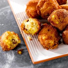 some fried food is on a plate and ready to be eaten