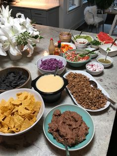 a table full of food with the words how to set up a healthier nacho bar