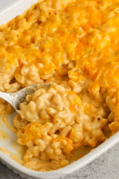 a casserole dish with macaroni and cheese in it, ready to be eaten