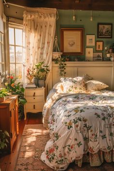 a bed sitting in a bedroom next to a window covered with curtains and flowers on it