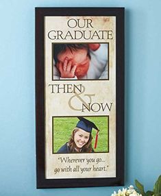 a graduation photo hanging on the wall next to a vase with flowers in it and a sign that says, our graduate then & now