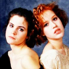 two women with red hair are posing for the camera