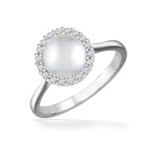 a white pearl and diamond ring