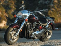 a motorcycle parked on the side of a road