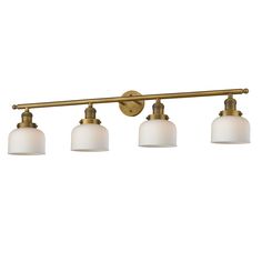 four light bathroom fixture in antique brass finish with white glass shades on the bottom and sides