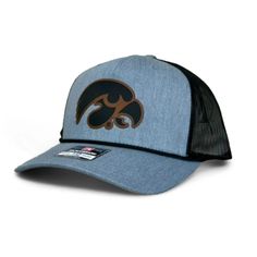 a blue hat with an eagle on it